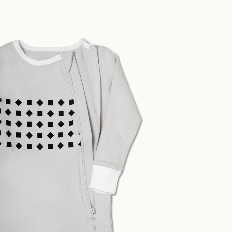 zoomed in on nanit pajamas in pebble gray #color_pebble gray